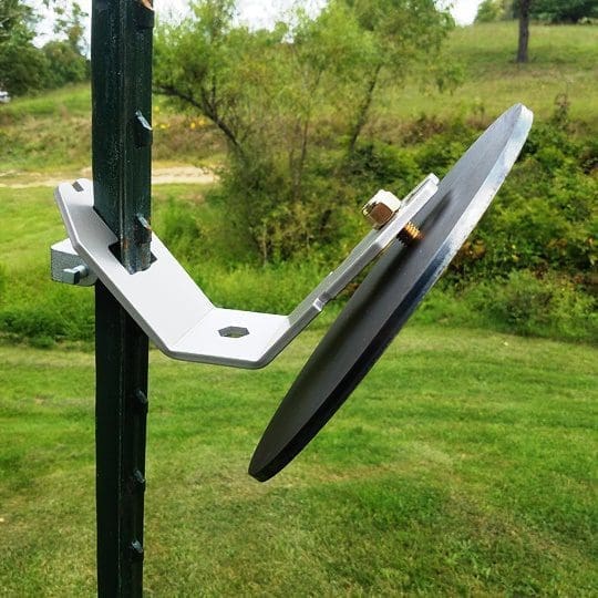 Hang Fast 10 inch round AR 500 1/4" Steel Target with Standard Hanger and bolt mount, mounted on a T Post