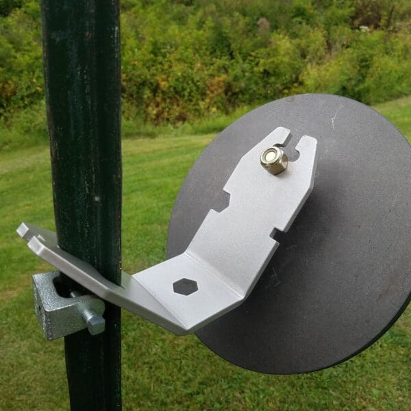 Hang Fast 10 inch round AR 500 1/2" Steel Target with Standard Hanger and “bolt mount” mounted on a T Post