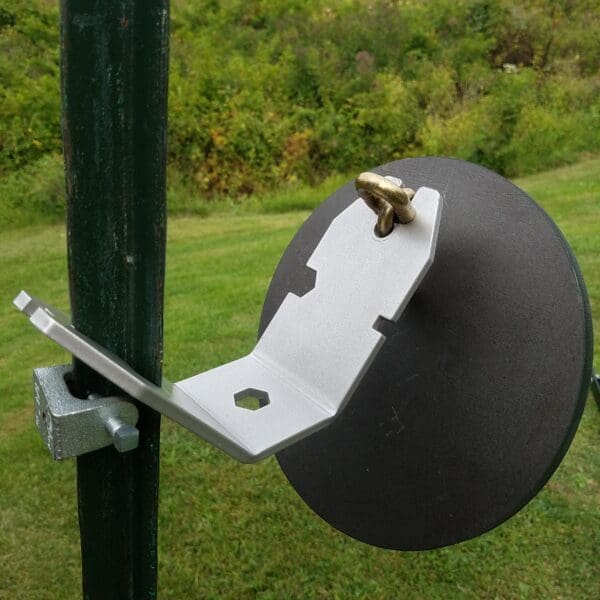 Hang Fast 10 inch round AR 500 1/2" Steel Target with Standard Hanger and “chain mount” mounted on a T Post