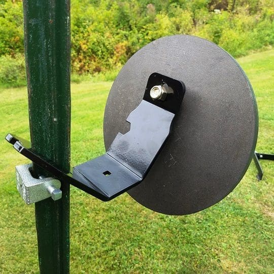 Hang Fast Fail Safe T Post target hanger with 10 inch round AR500 target plate mounted on a T Post.