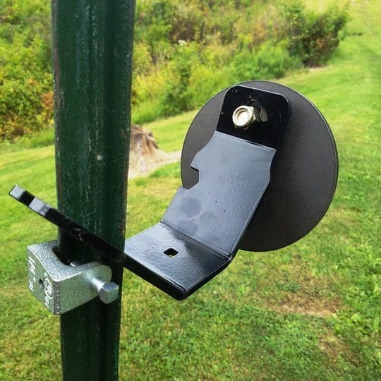 Hang Fast Fail Safe T Post target hanger with 6 inch round AR500 target plate mounted on a T Post.