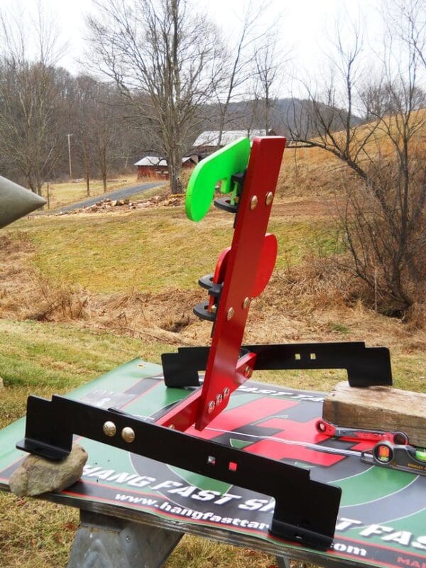 Hang Fast 2 Plate fully armored Swinging Target on our All-Terrain adjustable base.