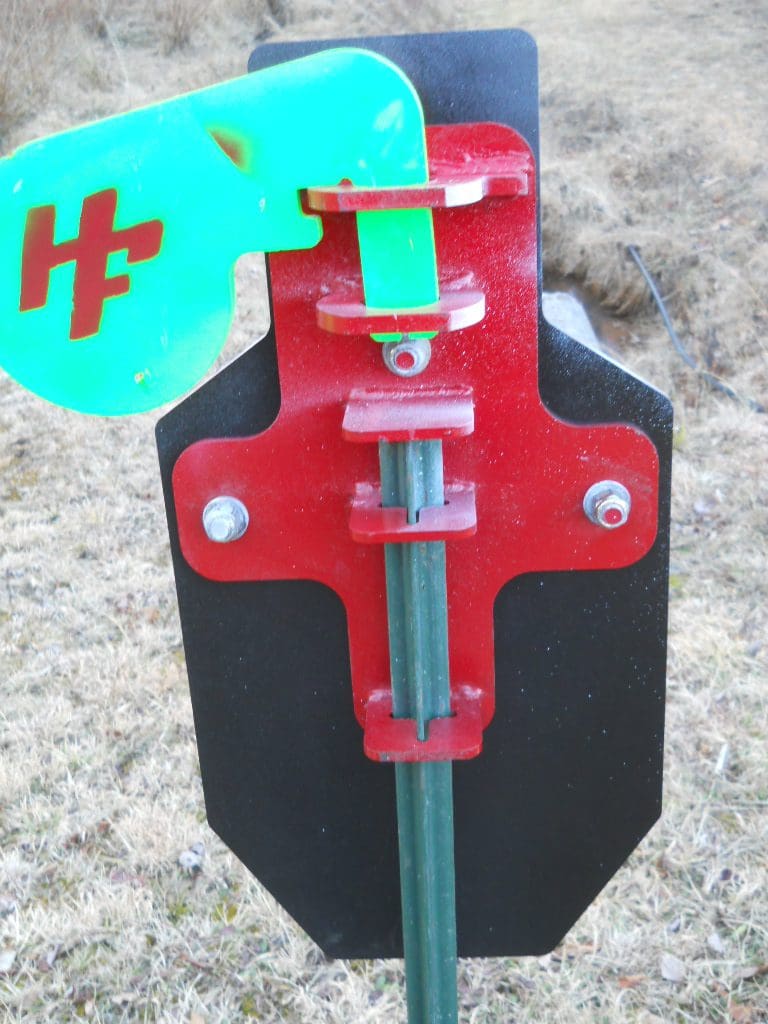 Hang Fast IPSC Hostage Swinging Target AR500 Mounted on a T Post.