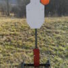 Hang Fast IPSC Hostage Swinger Target mounted on our armored All-Terrain T Post base