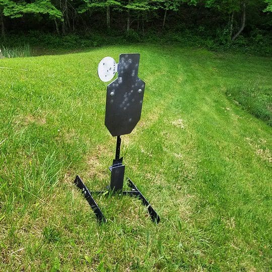 Hang Fast IPSC AC AR 500 hostage target swinger T Post mount on an all terrain base.