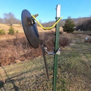 Hang Fast T-Post armor mounted on a T Post with a 12 inch AR500 target mounted above